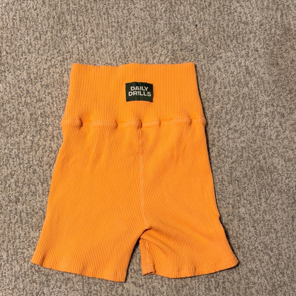 daily drills orange biker shorts